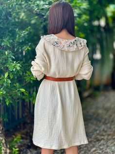 White Cotton Gauze Spring Dress, White Cotton Gauze Dress For Spring, Casual Cotton Gauze Long Sleeve Dress, Casual Long-sleeved Cotton Gauze Dress, Casual Long Sleeve Cotton Gauze Dress, Long Sleeve Smock Beige Dress, Collared Cream Dresses For Spring, Collared Cream Spring Dress, Cream Collared Spring Dress