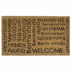 a welcome mat with words written in black on the front and back, which reads welcome