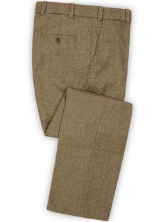 You will be a perfect sartorial standout every time you wear our Naples Melange Brown Tweed pants. Crafted from wool, the tweed pants in brown boast a contemporary update on a classic staple and is a fine addition to your work-to-weekend wardrobe. Combine it with a matching jacket and waistcoat, a white cotton shirt, a dotted red tie and black shoes for a timeless take on smart dressing. 
 
Look Includes   Naples Melange Brown Tweed Fabric  Cross Pocket  Flat Front  Two Welted Back Pockets    Cl Smart Dressing, Brown Tweed Suit, Grey Tweed Suit, Herringbone Tweed Jacket, White Linen Suit, Green Velvet Jacket, Peaky Blinders Suit, Royal Blue Suit, Fabric Cross