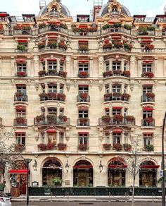 an old building with many windows and balconies