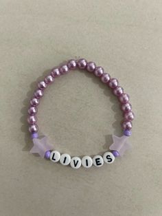 Olivia Rodrigo’s fanbase name “Livies” inspired beaded bracelet. Olivia Bracelet Ideas, Clay Bead Bracelet Ideas Olivia Rodrigo, Olivia Rodrigo Bracelet Ideas Clay Beads, Bracelet Ideas Olivia Rodrigo, Olivia Rodrigo Clay Bead Bracelet, Guts Rings Olivia Rodrigo