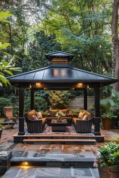 an outdoor gazebo with seating and lights