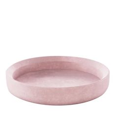 a round pink tray on a white background with no one in it or someone else