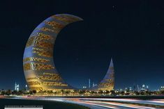 an artistic view of a curved building at night