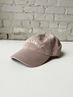 This Holland "Dad Hat" is a classic. The neutral tones are sure to match every outfit all year round. Embroidered locally in Grand Rapids. Regular fit 100% Cotton Hand wash Classic Cream Dad Hat, Classic Cream Baseball Cap For Spring, Classic Hat With Embroidered Logo, One Size Fits Most, Classic Hat With Embroidered Logo, One Size, Classic Hat With Embroidered Logo, Adjustable Beige Dad Hat For Spring, Beige Summer Hats With Embroidered Logo, Casual Embroidered Baseball Cap With Short Brim, Brown Hats With Embroidered Logo For Summer