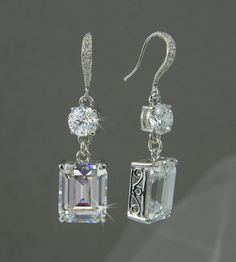 Crystal Bridal earrings Emerald Cut Wedding by CrystalAvenues Elegant Bridal Earrings With Diamond Cut Crystal, Wedding Bridal Earrings With Diamond-cut Crystal, Anniversary Bridal Earrings With Diamond Cut Crystal, Wedding Diamond Cut Crystal Drop Earrings, Diamond Cut Crystal Earrings For Anniversary, Anniversary Crystal Earrings With Elegant Design, Silver Crystal Earrings With Diamond Cut For Wedding, Silver Diamond Cut Crystal Earrings For Wedding, Sterling Silver Bridal Earrings With Diamond Cut For Wedding