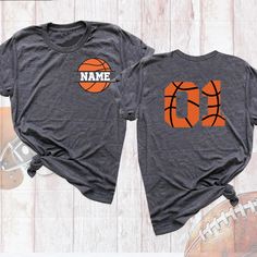 Basketball Custom Name Shirt, Basketball Mom Tshirt, Basketball Player Shirt, Basketball Team Tee, Basketball Number Shirt, Basketball Shirt Welcome to My Store! Get game day ready with this Basketball Shirt! Personalize it with a name on this Basketball Custom Name Shirt or surprise a sports mom with a stylish Basketball Mom Shirt. This Personalized Basketball Tee is perfect for teams or fans, making it a must-have Basketball Team Tee. Show your love for the game with this awesome Game Day Shir Orange Crew Neck Top For Sports Events, Orange Short Sleeve Tops For Sports Events, Orange Short Sleeve Team Spirit Top, Orange Crew Neck T-shirt With Team Name, Orange Graphic Print Top For College, Sporty Orange Top, Cotton Team Spirit Tops With Name Print, Gray Graphic Tee With Team Name, Custom Print Cotton Tops For Sports