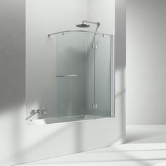 a white bathroom with a glass shower door