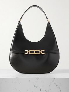 TOM FORD's 'Whitney' shoulder bag is a chic and timeless style. It's crafted from smooth leather that's embellished with signature gold 'T' hardware and has a lined interior that's sized to hold your phone, sunglasses and compact - plus a slip pocket for your most-used cards. Tom Ford Bag, Denim Flats, Tom Ford Handbags, Sport Swimwear, Sports Skirts, Fine Jewelry Designers, Ski Wear, Couture Fashion, Timeless Style