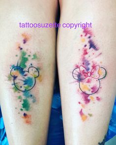 two tattoos with mickey and minnie mouse designs on their legs that are colored in different colors