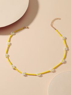 Color: Yellow Gender: Women Material: Glass Quantity: 1 piece Details: Flowers, Pearls Type: Chokers IN Length 15-16.9 This data was obtained from manually measuring the product, it may be off by 1-2 CM. Yellow Bracelet Beads, Beeded Necklace, Simple Beaded Necklace, Small Diamond Necklace, Diy Pearl Necklace, Simple Beaded Necklaces, Diy Beaded Rings, Pretty Jewelry Necklaces, Yellow Bracelet