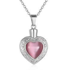 This beautiful piece of high quality jewelry is designed to hold a tiny amount of a loved one or pet's ashes, ensuring that there is always a part of them held close to your heart. This solid 316L Stainless Steel pendant is in a heart shape with a pink Czech crystal surrounded by detailed band design. Measuring approximately 2.5cm/1.18" in overall height and 2.5cm in width. The solid 316L Stainless Steel 'box' chain measures approximately 45cm (18"). Each Pendant comes beautifully presented in i Heart Cut Birthstone Jewelry For Keepsake, Keepsake Heart Cut Birthstone Jewelry, Stainless Steel Keepsake Necklaces For Valentine's Day, Heart-shaped Stainless Steel Keepsake Necklaces, Heart-shaped Keepsake Stainless Steel Necklaces, Open Heart Birthstone Jewelry Keepsake, Heart Cut Birthstone Necklace For Keepsake, Keepsake Heart Pendant In Stainless Steel, Heart-shaped Jewelry For Valentine's Day Memorial