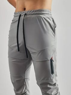 This is AHA moment!  This Tactical Cargo Jogger is made with four-way stretch and cooling tech fabric. Make sure to feel comfortable throughout your workout and throughout the day.  Product Details   4-way stretch fabric with cooling tech Ultra lightweight and moisture-wicking Elastic waistband with drawcord designs that offer support and comfort Breathable and sweat-wicking fabrics for indoor and outdoor activities High rib hems Engineered 5 pockets and a towel holder  Fabric & Care   Fabric： 8 Gray Functional Cargo Pants For Outdoor, Functional Gray Cargo Pants For Outdoor, Functional Moisture-wicking Cargo Pants For Workout, Urban Sport Joggers With Side Pockets, Urban Sports Joggers With Side Pockets, Urban Activewear With Pockets For Workout, Nylon Joggers With Pockets For Jogging, Urban Joggers With Side Pockets For Sports, Sporty Breathable Cargo Pants For Sports