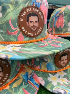 "Custom hats with leather patch - printed with cartooned photo of the groom and wording. You pick the hat, font, font color, and patch color - please see photos for options. Patch is 3\" x 2\". All hats (except floral print) have a snap back closure, The floral print has a leather strap closure as shown in photos. How it works: 1. Select hat color, patch color, font, and font coloring. 2. Message us the photo via Etsy messenger. 3. We will crop and cartoon the photo. 4. Hats are printed and deli Men’s Bachelor Party, Bridal Party Hats, Christmas Eve Plate, Bachelor Party Favors, Guys Trip, Drinking Team, Bachelor Party Gifts, Retro Fits, Funny Hats