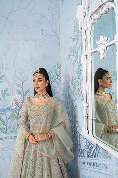 Indian Bridal Lehenga Choli and Dupatta Wedding Dress is an elegant masterpiece that will give the gorgeous bride a head-turning look on the most important day of your life. This beautiful Lehenga Dress is adorned with embroidery and hand-crafted embellishments, making it your foremost priority for the wedding. Bridal Choli: The choli comes in an alluring pastel blue shade and is emblazoned with lavish silver details and embroidery. Hand-crafted work of sitara, mukaish, motifs, and stones enhanc Bridal Choli, Lehenga Dress, Beautiful Lehenga, Bridal Dupatta, Indian Bridal Lehenga, Indian Bridal Dress, Indian Lehenga, Bridal Lehenga Choli, Embroidery Hand