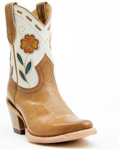 a pair of cowboy boots with flowers painted on the soles and heeled toes