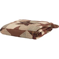 a brown and white checkered blanket on top of a bed