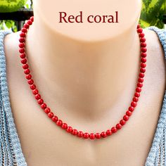 Discover the alluring charm of our Red Coral Bead Choker Necklace, a stylish Coral Necklace meticulously handcrafted with utmost care. This versatile necklace is designed for women, adding a touch of natural beauty and sophistication to any outfit. Materials:     Coral Beads: Our necklace features about 6mm coral beads, each carefully selected for their vibrant red hue and unique patterns. Coral is known for its soothing and protective properties, making this piece not only fashionable but also Red Coral Necklaces With Round Beads As Gift, Red Coral Necklace With Round Beads As Gift, Red Coral Jewelry With 8mm Beads, Single Strand Red Coral Necklace Gift, Single Strand Red Coral Necklace As Gift, Colorful Beads Red Coral Necklace Gift, Red Single Strand Necklace For Gift, Elegant Red Beaded Necklace With Lobster Clasp, Gift Beaded Necklace With Red Coral And Lobster Clasp