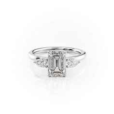 The Lauren WG EM Emerald Cut Solitaire, Emerald Cut Moissanite, Lab Diamond Engagement Ring, White Gold Solitaire, Pear Cut Diamond, Types Of Diamonds, Three Stone Engagement, Three Stone Engagement Rings, Moissanite Wedding Bands