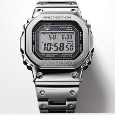 Limit of One Watch per Customer. Ships to USA Only. Available for order. Allow up to 3 weeks for delivery. GMW-B5000 / Released to celebrate the 35th anniversary of this iconic design. A SQUARE CASE WITH A FULL-METAL SHOCK-RESISTANT STRUCTURE. ACHIEVED THROUGH SYSTEMATIC EVOLUTION FROM ONE STAGE TO THE NEXT. The first G-SHOCK model DW-5000C was born in 1983. Its symbolic square design is reinvented with a full-metal shock-resistant structure and the latest advanced functions, including Smartphon Business Chronograph Watch In Silver With 10atm Water Resistance, Silver Classic Digital Watch With Date Display, Classic Silver Digital Watch With Date Display, Silver Automatic Digital Watch, Silver Digital Watch With 10atm Water Resistance, Classic Silver Digital Watch With Subdials, Born In 1983, Casio Vintage, Solar Watch