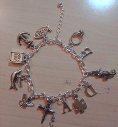 I assemble these bracelets myself, and you will have to message me with what specific charms you want or give me a theme to go off of. I can put up to 14 charms on one bracelet. While I can make sure that the chain itself is silver, steel, etc., I can not confirm that the charms, from where I buy them, do not have nickel in them if that is a concern. I may buy charms from another place by that may change the price of the order and that will discussed. Custom Apple Watch Bands, Custom Charm Bracelet, Custom Charms, Go Off, James Avery, Girly Jewelry, Charm Bracelets, Apple Watch Bands, Watch Bands