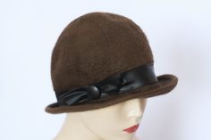 Vintage wool hat Womens fedora Size small Ladies hat Brown hat Wool hat Warm hat Winter hat Casual fedora Wool fedora Ladies hat Retro hat Vintage genuine wool hat.  Size: small, 55 Condition: In perfect vintage condition Please refer photos for condition Brown Wool Cloche Hat With Short Brim, Retro Cloche Felt Hat For Winter, Retro Winter Cloche Felt Hat, Brown Wide Brim Cloche Hat, Formal Brown Winter Hats, Classic Wool Cloche Fedora, Winter Retro Cloche Hat With Short Brim, Retro Winter Cloche Hat With Short Brim, Brown Fur Felt Cloche Hat