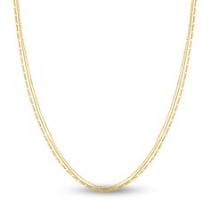 Dazzling bead, box and figaro chains stack and drape elegantly to accentuate any style in this contemporary women's triple layer chain necklace. Fashioned in 14K yellow gold, the 18-inch chain secures in place with a lobster clasp. The bead chain width measures at approximately 1mm, the box chain at 0.66mm and the figaro at 1.3mm. Multi-strand Figaro Chain Necklace, Multi-strand Figaro Chain Necklaces For Layering, Elegant Double Strand Box Chain Necklace, Multi-strand Figaro Chain Necklace For Gift, Multi-strand Figaro Chain Necklace As Gift, Dainty Multi-strand Figaro Chain Necklace, Dainty Multi-strand Layered Necklace With Figaro Chain, Elegant Multi-strand Chain Necklace With Box Chain, Gold Multi-strand Necklace With Figaro Chain