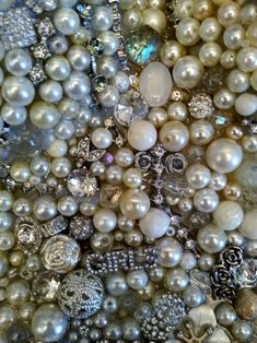 many different types of pearls are arranged together