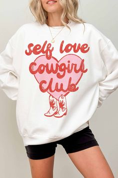 This Cute Valentines Sweatshirt is the perfect gift or outfit for valentines day. Its trendy, fun and cute for valentines. Soft girl era!!  This valentines day be trendy and cozy in our Self Love Cowgirl Club Era sweatshirt. Coquette Girl Clothes Q U I C K * F A C T S * ♥️ 100% Soft cotton ♥️Design is high quality digital print ♥️ Wash and dry normally. Do not iron directly on the print. * S I Z I N G * ♥️ Sizing is unisex so runs like men's ♥️Most women find their typical size works best. ♥️ Pl Cute Crew Neck Sweatshirt For Valentine's Day, Cute Valentine's Day Crew Neck Sweatshirt, Trendy Valentine's Day Crew Neck Sweatshirt, Cute Valentine's Day Graphic Print Sweatshirt, Valentine's Day Cotton Sweatshirt With Heart Graphic, Cute White Sweatshirt With Screen Print, Cute White Sweatshirt With Graphic Print, White Casual Sweatshirt For Valentine's Day, Valentine's Day White Casual Sweatshirt