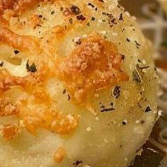 a close up of some food on a plate with broccoli sprouts