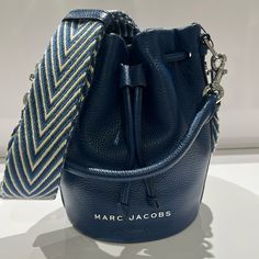 Nwt Marc Jacobs Azure Blue Bucket Bag With Strap Modern Navy Bag With Adjustable Strap, Blue Bucket Bag With Detachable Handle As Shoulder Bag, Modern Navy Bag With Detachable Strap, Modern Bucket Bag With Branded Hardware For Travel, Blue Bucket Bag With Detachable Handle, Blue Bucket Bag With Detachable Handle For Errands, Blue Luxury Bag For On-the-go, Luxury Navy Bags With Adjustable Strap, Luxury Blue Shoulder Bucket Bag