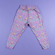 Keep warm and comfy with our Weird N Wavy Joggers. The joggers feature a custom-printed pattern and four printed icons on the lower left leg 80% cotton / 20% polyester fleece 100% polyester lining Stretch Cotton Bottoms With Graphic Print, Patterned Cotton Bottoms For Loungewear, Casual Multicolor All-over Print Pants, Casual Multicolor All Over Print Pants, Athleisure Graphic Print Loungewear Pants, Casual Cotton Printed Bottoms, Athleisure Graphic Print Pants For Loungewear, Casual Printed Cotton Bottoms, Casual Multicolor Pants With All Over Print