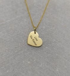 "Love You Necklace - Engraved Couples Charm - Gold Graduation Charm - Gold Heart Shape Pendant ▪️ A beautiful and clean engraved heart shaped pendant made out of 14K Solid Real Gold. Available in Yellow Gold, White Gold or Rose Gold finishes. Dimensions of the pendant - 1.3x0.9cm / 0.51x0.35 inches Necklace Length - You can choose your chain length from 35CM to 50CM. The pendant is available alone without a chain, select \"No Chain\" on the necklace length section. ▪️ We can engrave the back of Wedding Yellow Gold Heart Cut Charm Necklaces, Heart-shaped Name Charm Necklaces For Wedding, Heart Shaped Name Charm Necklaces For Wedding, Heart Name Charm Necklaces For Wedding, Heart-shaped Name Charm Necklace For Wedding, Double Heart Yellow Gold Charm Necklace For Wedding, Gold Heart Charm Necklace For Wedding Gift, Gold Heart Charm Necklace Wedding Gift, 14k Stamped Heart Necklace For Valentine's Day Gift