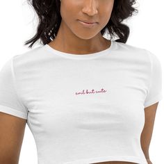 Embroidered crop top t-shirt. Tee with pink embroidery on the chest. Evil but cute shirt, it's a statement piece. Ultra comfy tee that comes in white with a extra-small/small size and a medium/large  size. Shirt for evil energy days, cute energy days, and everything in between. Y2k inspired baby tee crop top.  Extra-Small/Small Size Measurements: Length: 16 1/2 inches Width: 15 5/8 inches Medium/Large Size Measurements: Length: 17 1/2 inches Width: 17 1/8 inches * 52% combed ring-spun cotton, 48% polyester * Fabric weight: 3.6 oz/yd² (122 g/m²) * 40 singles * Slim fit * Side-seamed construction * Blank product sourced from Nicaragua, the US, or Honduras Shirt is made as soon as you place your order, this helps reduce overproduction, so thank you for your thoughtful purchasing decisions. We Tee Embroidery, Extra Petite, Embroidered Crop Tops, T Shirt Crop Top, Cute Crop Top, Baby T Shirts, Cute Crop Tops, Cropped Tops, Cute Shirt