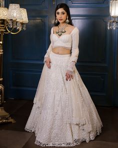 This ivory lehenga set features all over pearl, sequin, crystals, cutdana embroidery and a statement embroidered full sleeve blouse. Paired with an embellished hand embroidered dupatta in net.DELIVERY TIMEPlease allow 8-12 weeks for your outfit to arrive.FABRIC DETAILSNetProfessional cleaning only. Ivory Bridal Lehenga, Hand Embroidered Dupatta, Ivory Lehenga, Cutdana Embroidery, Full Sleeve Blouse, Embroidered Dupatta, Ivory Bridal, 12 Weeks, Bridal Lehenga