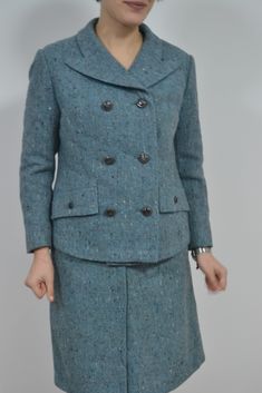 "Vintage women two piece suit in blue wool tweed with beige and white pois. Beautiful structured suit, entirely hand-sewn, 60's, Made in Italy. The jacket has a beautifully finished spear neck and double-breasted buttoning; it is fully lined and enriched with a matching trimming. The conditions of the inner lining are excellent, considered the epoch, introduces only of the points under the armpits where the cloth has faded, but externally it does not introduce some defect. The trapeze skirt has 60s Skirt, Tweed Suit, Womens Suits, Tailored Suit, Tweed Suits, Vintage Studio, Tailored Suits, Vintage Women, Blue Wool