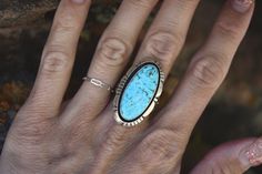 A rare Turquoise Mountain Stone: light blue in color with earth toned matrix on a vintage silver band. From the Rodgers Collection. Handmade in the USA. Size 8.5 Blue Sterling Silver Ring With Patina, Blue Sterling Silver Rings With Patina, Unique Blue Patina Rings, Artisan Blue Rings With Patina, Native American Jewelry, Silver Band, Earth Tones, Vintage Silver, Matrix