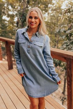 - Get dolled up in this cute denim mini dress! Its sweet, laid-back energy makes it the perfect addition to your everyday wardrobe. Style it with your favorite boots and a wide brimmed hat for an effortlessly charming look. - Unlined non-stretch denim - A button-down collared v-cut neckline - Functional chest pockets - Long sleeves with button closure cuffs - Hidden side pockets - A relaxed silhouette that ends in a curved, mini dress length hemline Casual Washed Blue Chambray Denim Dress, Light Wash Chambray Denim Top For Day Out, Casual Chambray Denim Dress Medium Wash, Washed Blue Chambray Denim Dress For Day Out, Light Wash Chambray Denim Dress For Fall, Washed Blue Chambray Denim Dress, Medium Wash Chambray Denim Dress, Casual Medium Wash Chambray Denim Dress, Light Wash Denim Mini Dress