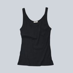 Your new favorite tank top. Slim ribbed scoop neck tank in a cozy modal jersey with stretch. Bra friendly. Model wears a size small 94% modal, 6% elastane Denim Sweater, Dress Skirt, Knitted Sweaters, Scoop Neck, Tank Top, Top Outfits, Tank Tops, Collage, Bra