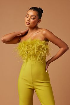 Available In White And Chartreuse. Bandage Jumpsuit Feather Top Strapless Flare Leg Hidden Back Zipper Stretch Disclaimer: Feather Fall Out May Happen.95% Polyester 5% Spandex Imported | Fay Feather Bandage Jumpsuit in Chartreuse size Medium by Fashion Nova Bandage Jumpsuits, Feather Tops, Fashion Nova, Favorite Color, Jumpsuit, Zipper, Color