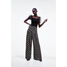 New With Tag. Brand New With Tags Flowy High-Waisted Pants With Front Pleat Detail. Hidden In-Seam Side Zip Closure. - 100% Polyester - Approximate Measurements: 13.5" Waist Across, 16" Rise And 31.5" Inseam 7563/056 Box4 Elegant Fitted Polka Dot Bottoms, Chic Polka Dot Bottoms For Spring, Elegant Polka Dot Bottoms For Workwear, Elegant Polka Dot Bottoms For Work, Chic Polka Dot Summer Bottoms, Chic Polka Dot Wide Leg Pants, Chic Wide Leg Polka Dot Pants, Polka Dot Bottoms For Spring Party, Polka Dot Party Bottoms For Spring