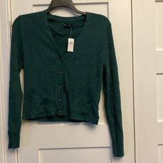 Nwt Gap Skinny Rib V-Neck Cardigan In What They Call "June Bug Green." Smoke-Free Home. Pit To Pit Approximately 20". Shoulder To Hem Approximately 21". Green V-neck Cardigan For Layering, Gap Tops For Winter Layering, Gap V-neck Fall Sweater, Gap Long Sleeve Cardigan For Spring, Gap Cardigan With Button Closure For Fall, Gap Button-up Cardigan For Fall, Gap Casual Spring Sweater, Gap Long Sleeve Outerwear For Layered Wear, Gap Sweater For Spring Layering