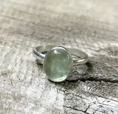 Minimalist Apple Green Brazil Oval Prehnite Elegant Solitaire Sterling Silver Ring | Green Gemstone Ring | Solitaire Ring | Engagement Ring by GildedBug on Etsy Minimalist Green Oval Jewelry, Green Oval Moonstone Gemstone Ring, Green Oval Moonstone Ring, Oval Green Moonstone Gemstone Ring, Minimalist Oval Emerald Ring In Sterling Silver, Green Oval Moonstone Ring In Sterling Silver, Green Oval Prehnite Rings, Handmade Green Moonstone Ring In Sterling Silver, Green Cabochon Moonstone Ring In Sterling Silver