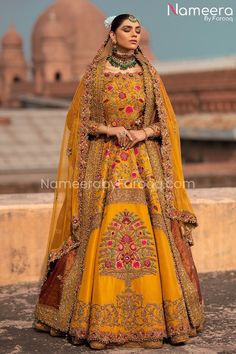 a woman in a yellow bridal gown