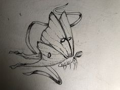 a drawing of a butterfly on a piece of paper