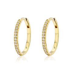 The largest size in our signature huggie series 15 mm Solid 18K Gold 16 round 1.1mm brilliant diamonds on each hoop, VS quality, G/H Color. TCW = 0.16 cts per hoop Hinged opening with hidden post closure Sold as a pair Timeless Gold Huggie Earrings With Brilliant Cut, Gold Round Huggie Earrings With Brilliant Cut, Small Hoop Yellow Gold Diamond Earrings With Halo Design, Gold Round Hoop Earrings With Brilliant Cut, Gold Hoop Earrings With Brilliant Cut, Yellow Gold Diamond Earrings With Halo Design, Timeless Round Huggie Earrings In Cubic Zirconia, Wedding Pave Setting Round Huggie Earrings, Everyday Small Hoop Huggie Earrings With Brilliant Cut