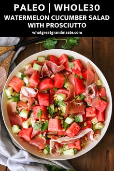 watermelon and cucumber salad in a white bowl with black chopsticks