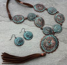 Western Tassel Linked Conchos Necklace Set Burnished Patina Color Matching Earrings 30″ + 5″ EXT Cowhide Handbags, Western Necklaces, Patina Color, Navajo Style, Southwestern Jewelry, Necklace And Earring Set, Leather Tassel, Matching Earrings, Long Necklace