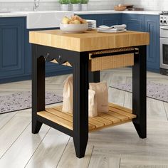 a kitchen island with a cutting board on it