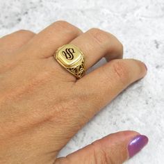 The initial signet ring is a classic piece of jewelry for both men and women. Bring a little bling with this unique square-shaped initial signet ring in 14k gold with your choice of initial letters made especially for you. The monogram seal ring is polished to a high finish and decorated with a delicate ornamental design that will certainly be noticed as a refreshing element in any day or night outfit. This monogram ring is a perfect gift for a birthday, anniversary, as bridesmaid's gift or for Engraved Adjustable Signet Ring For Anniversary, Personalized Symbolic Signet Ring For Anniversary, Adjustable Signet Ring With Engraving For Anniversary, Adjustable Engraved Signet Ring For Anniversary, Heirloom Style Rings With Monogram For Gifts, Heirloom Monogram Ring As A Gift, Adjustable 14k Stamped Signet Ring For Anniversary, Anniversary Initials Signet Ring With Open Design, Anniversary Signet Ring With Initials